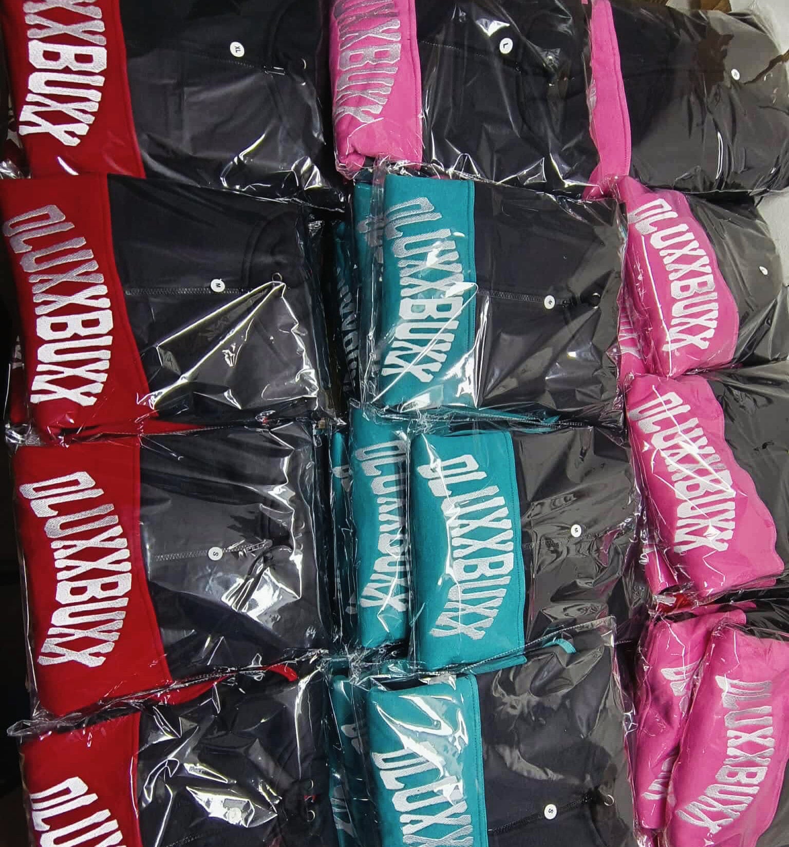 Almost sold out Teal and black Te Māhana drop tail dluxxbuxx hoodie